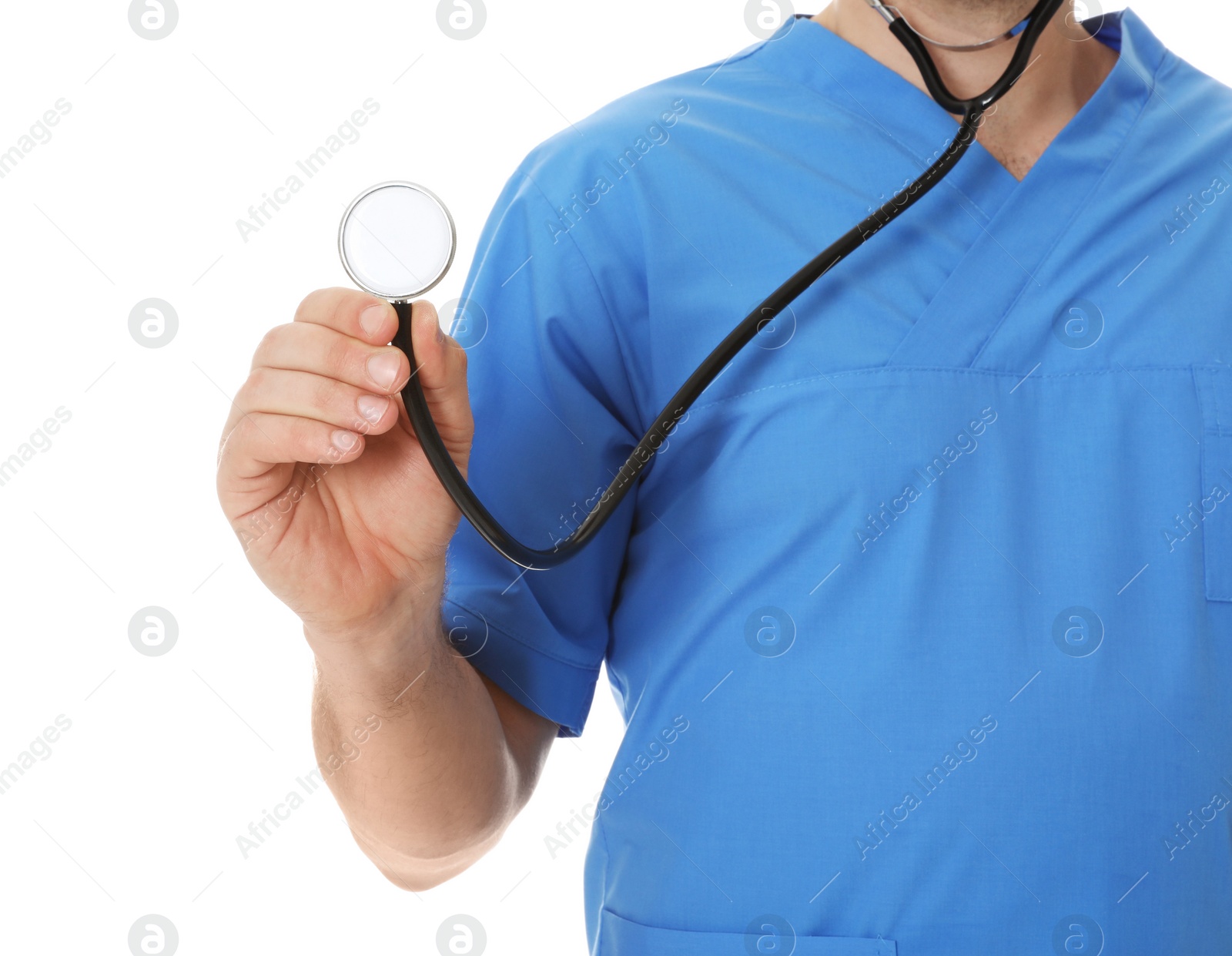 Photo of Closeup of male doctor in scrubs with stethoscope isolated on white. Medical staff