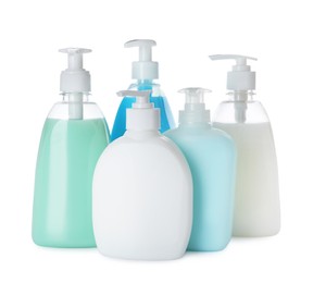 Photo of Dispensers of liquid soap on white background