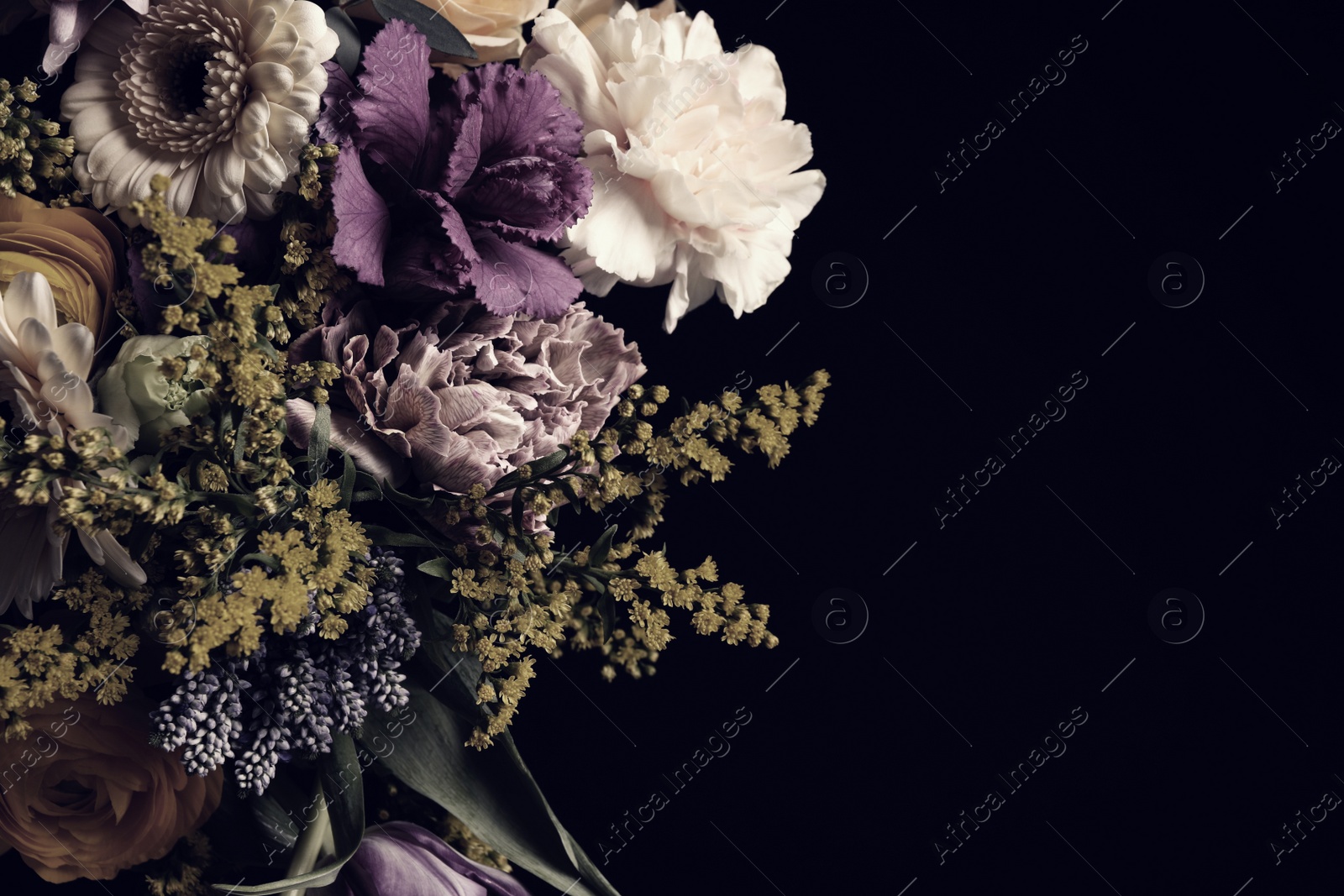 Photo of Beautiful bouquet of different flowers on black background, space for text. Floral card design with dark vintage effect