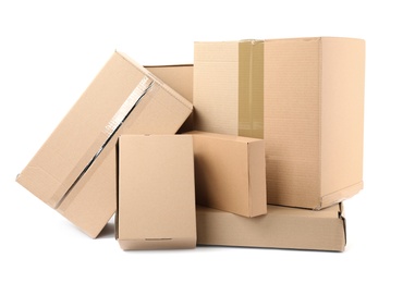 Photo of Pile of cardboard boxes on white background