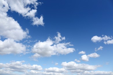 Photo of Picturesque view of beautiful fluffy clouds in light blue sky