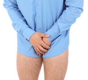 Photo of Young man with urological problems suffering from pain on white background