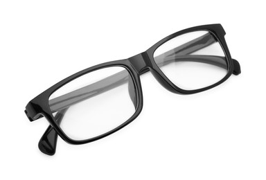 Photo of Stylish glasses with black frame isolated on white