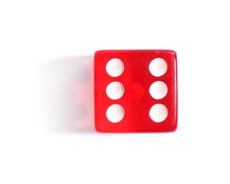 Photo of One red game dice isolated on white, top view