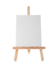 Photo of Wooden easel with blank canvas board on white background. Children's painting
