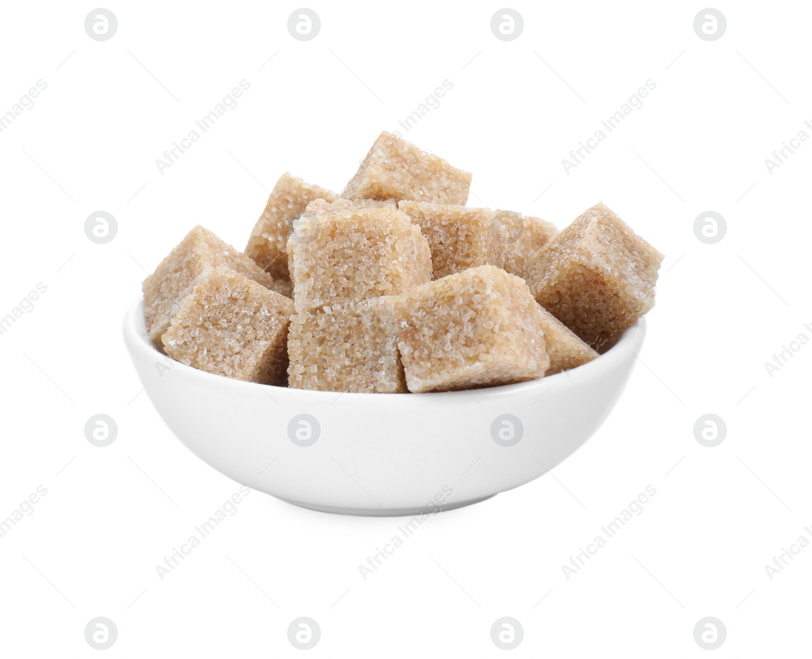 Photo of Brown sugar cubes in bowl isolated on white