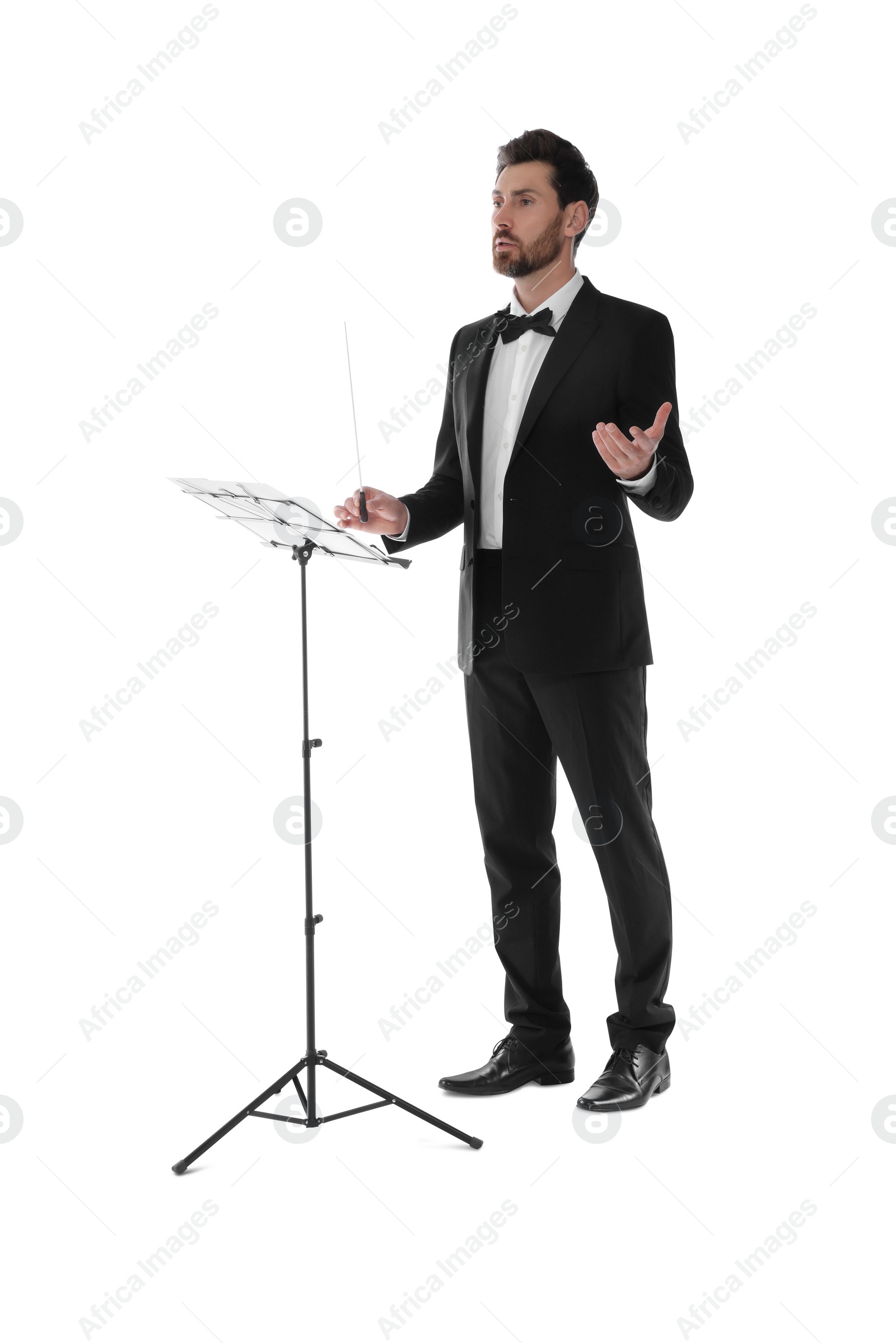 Photo of Professional conductor with baton and note stand on white background