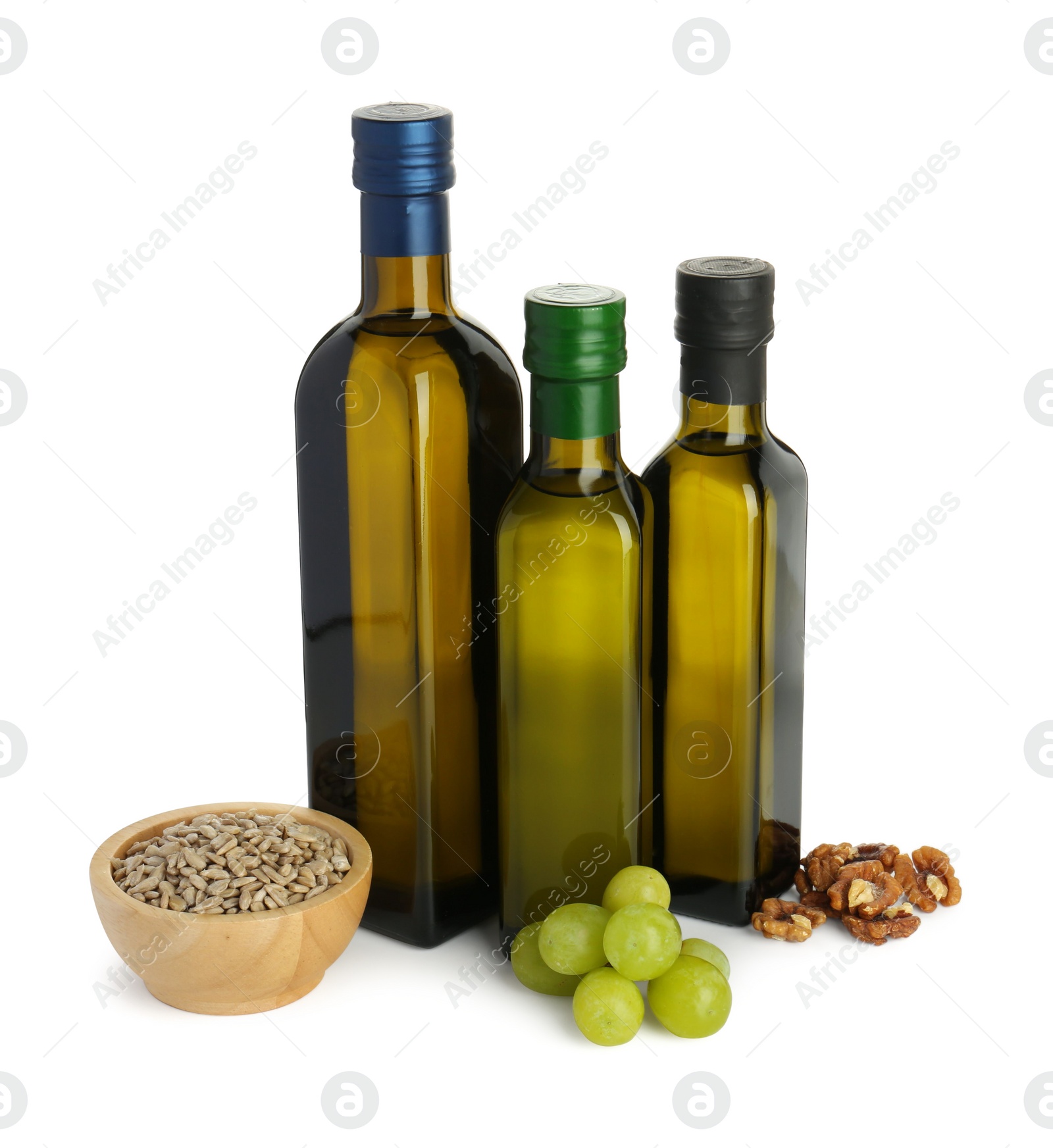 Photo of Vegetable fats. Bottles of different cooking oils and ingredients isolated on white