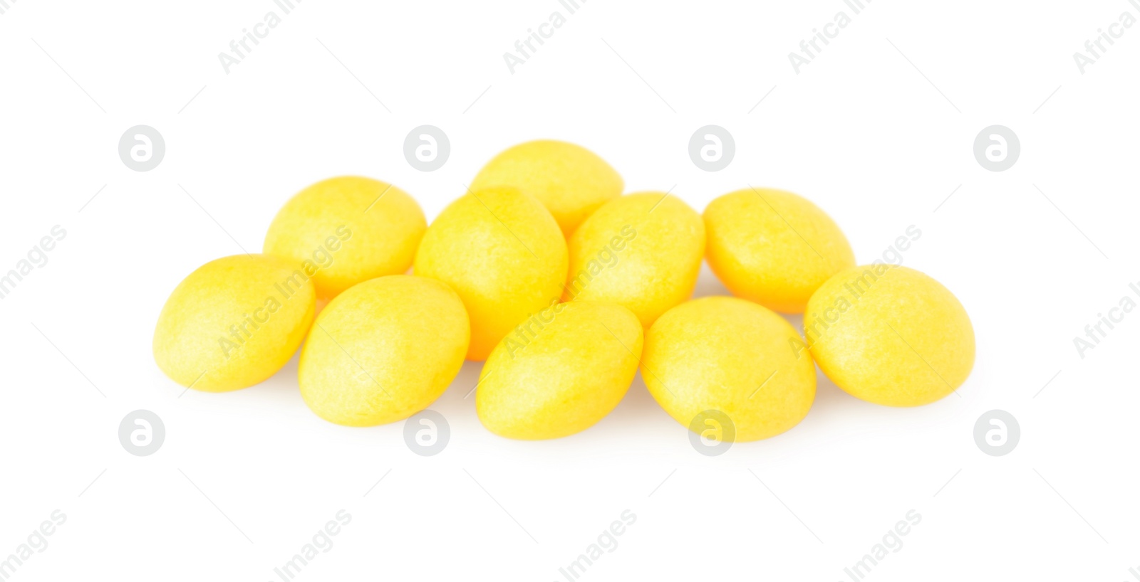 Photo of Tasty yellow chewing gums isolated on white