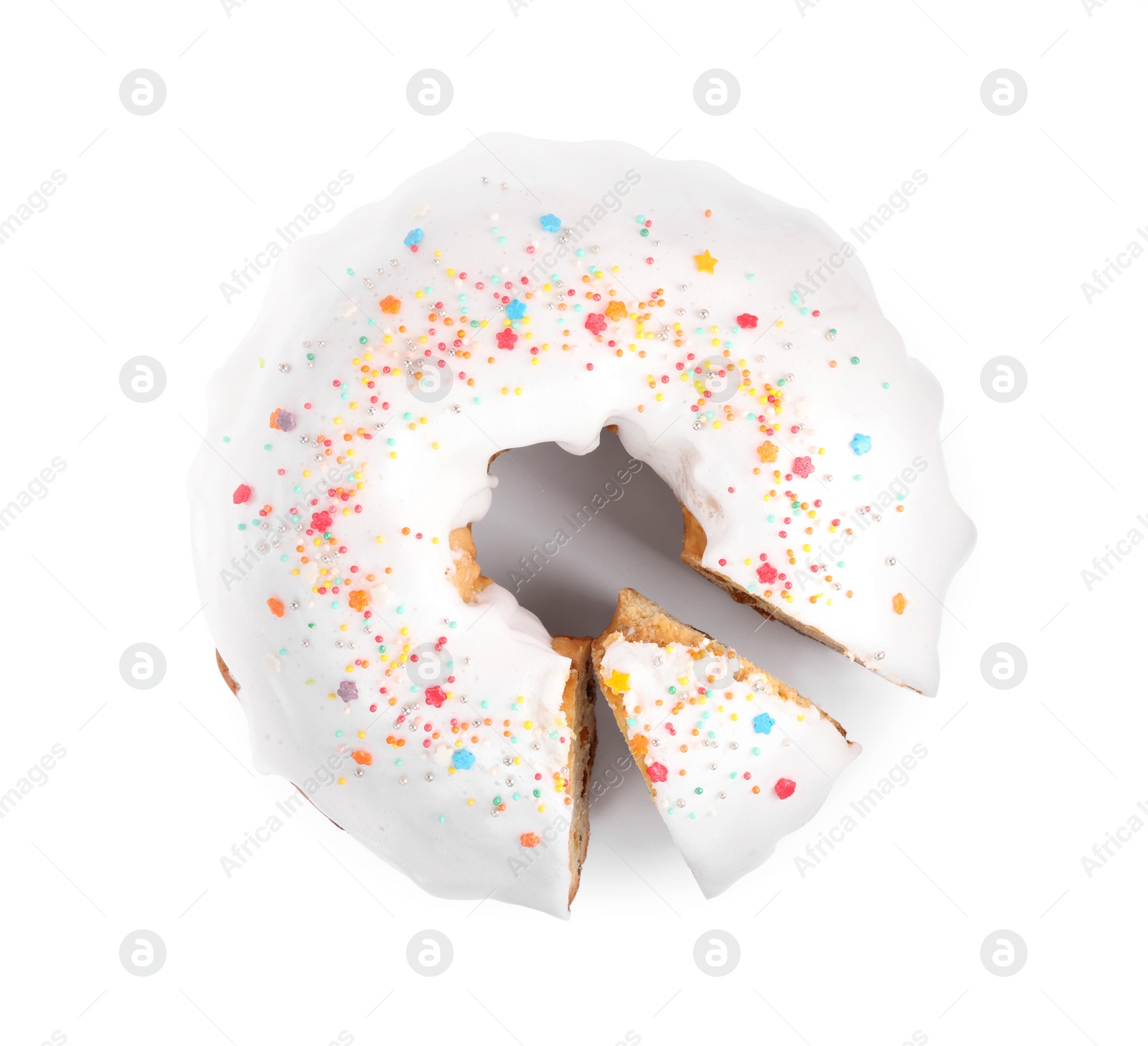 Photo of Traditional Easter cake with sprinkles on white background, top view