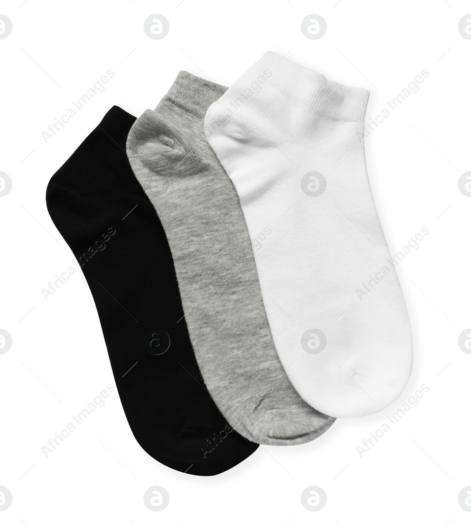 Photo of Different socks isolated on white, top view