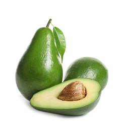 Ripe fresh avocados on white background