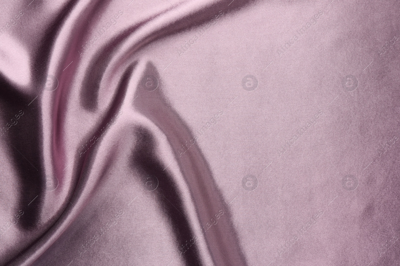 Photo of Texture of beautiful silk fabric as background, closeup