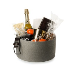 Photo of Christmas gift basket with champagne and tangerines on white background
