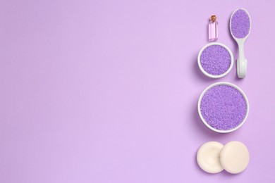 Photo of Flat lay composition with aromatic sea salt on purple background. Space for text