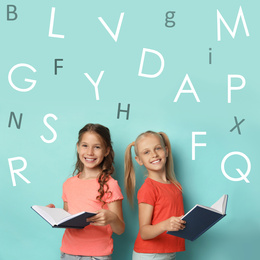Image of Little girls reading books on turquoise background