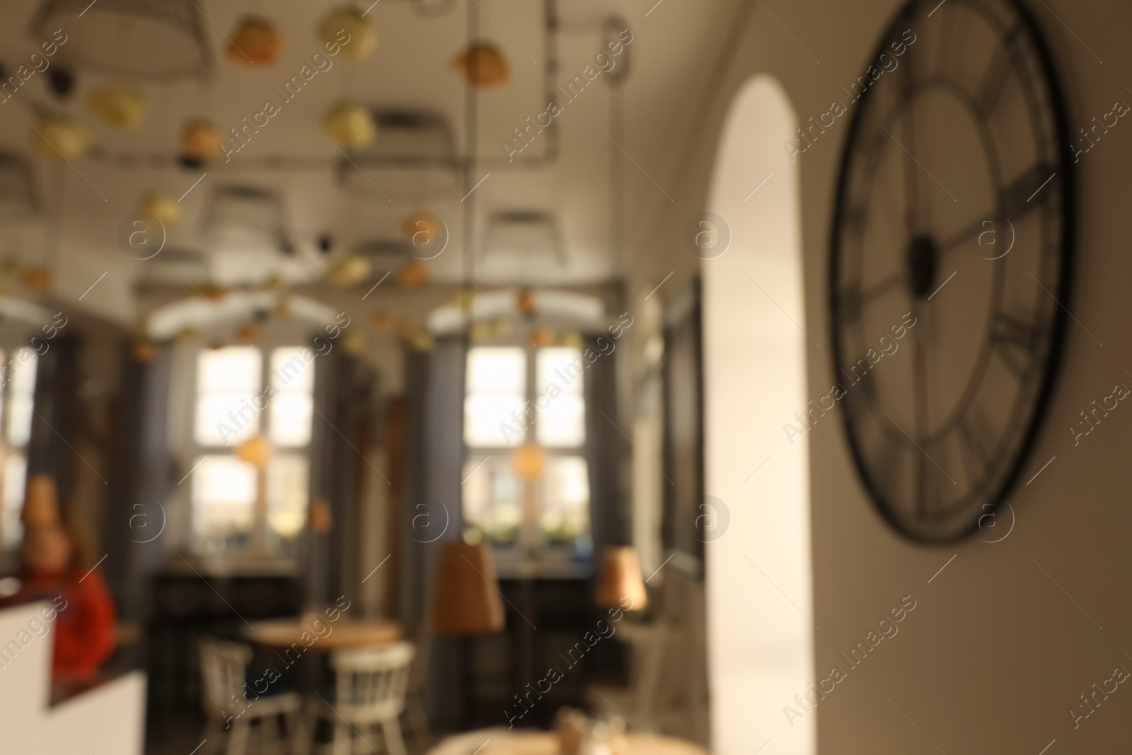 Photo of Blurred view of stylish modern cafe interior