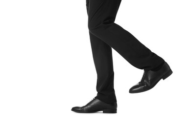 Photo of Businessman in leather shoes on white background, closeup