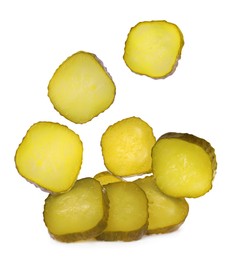 Image of Slices of tasty pickled cucumbers on white background