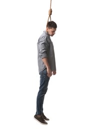 Depressed man with rope noose on neck against white background