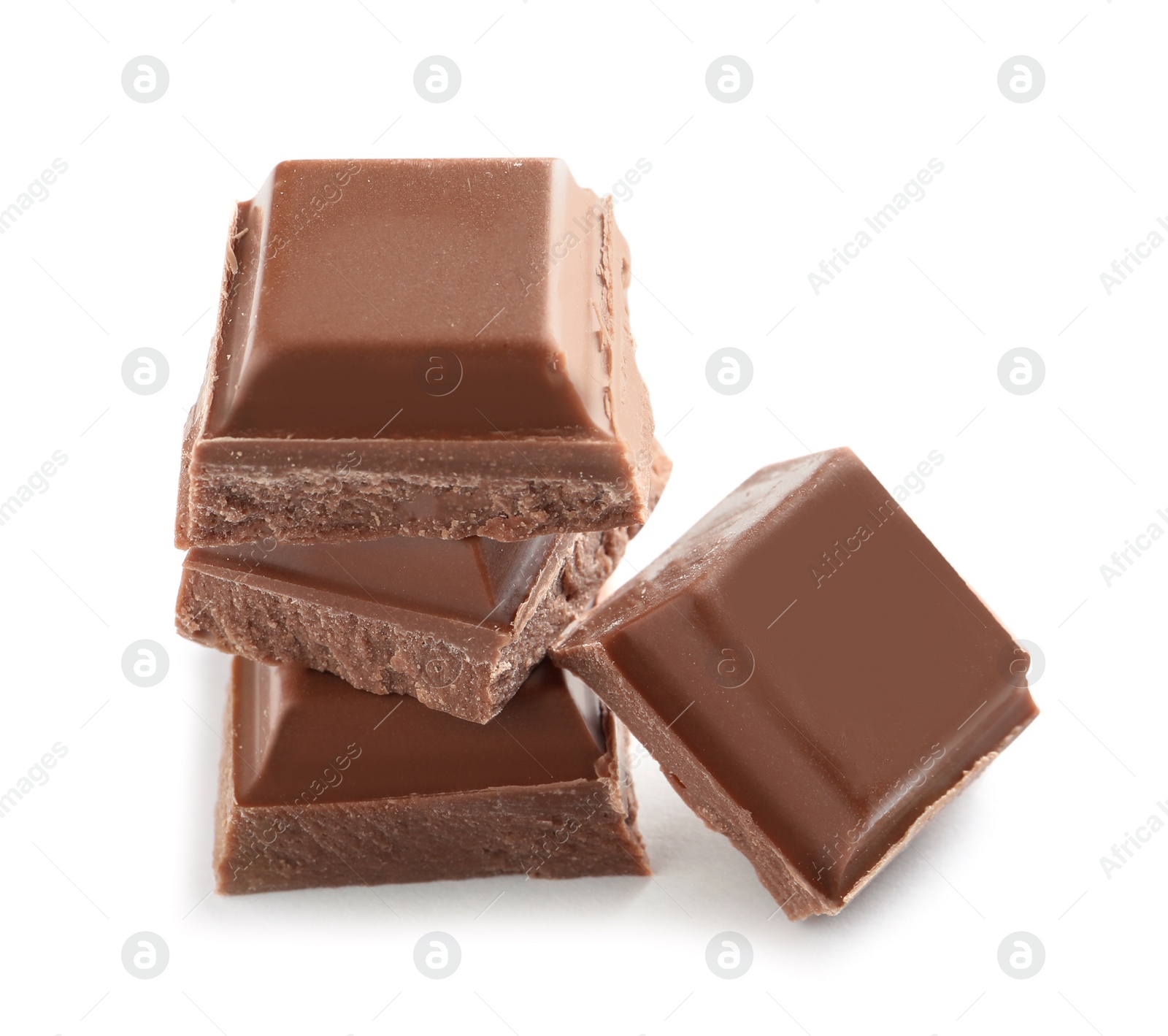 Photo of Pieces of tasty milk chocolate on white background