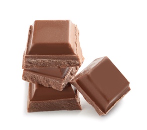 Photo of Pieces of tasty milk chocolate on white background