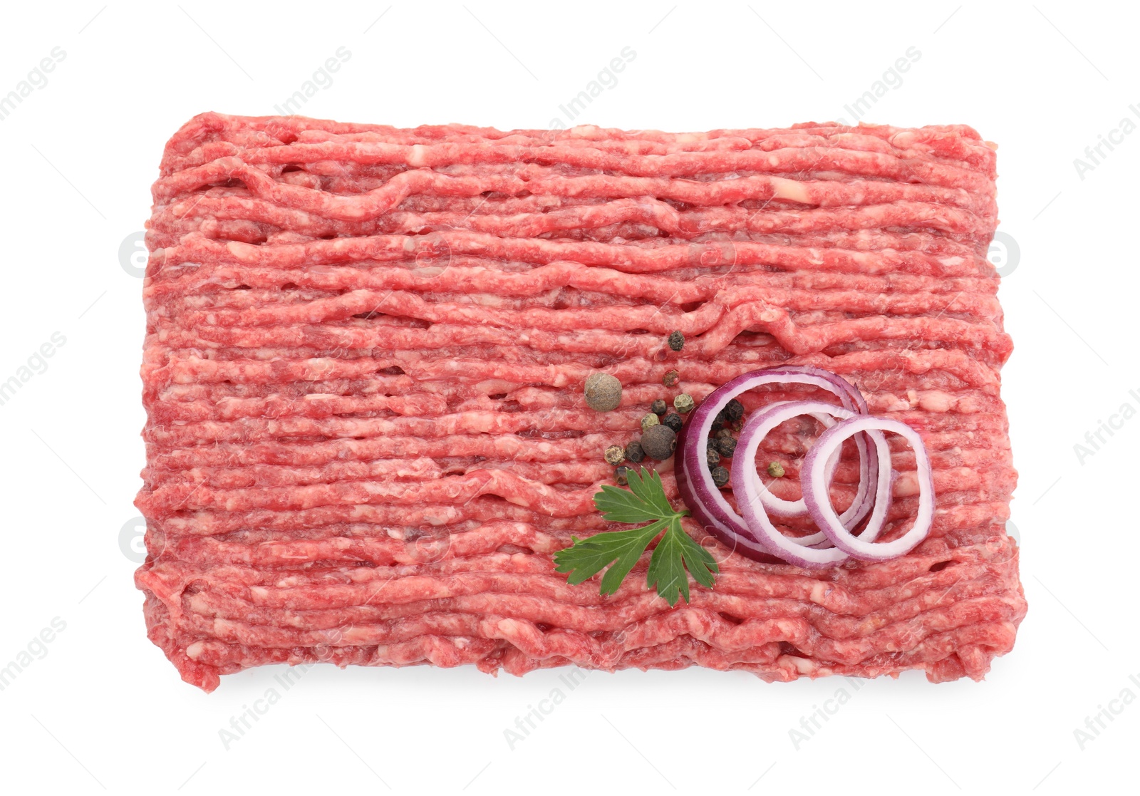 Photo of Raw ground meat, onion, peppercorns and parsley isolated on white, top view