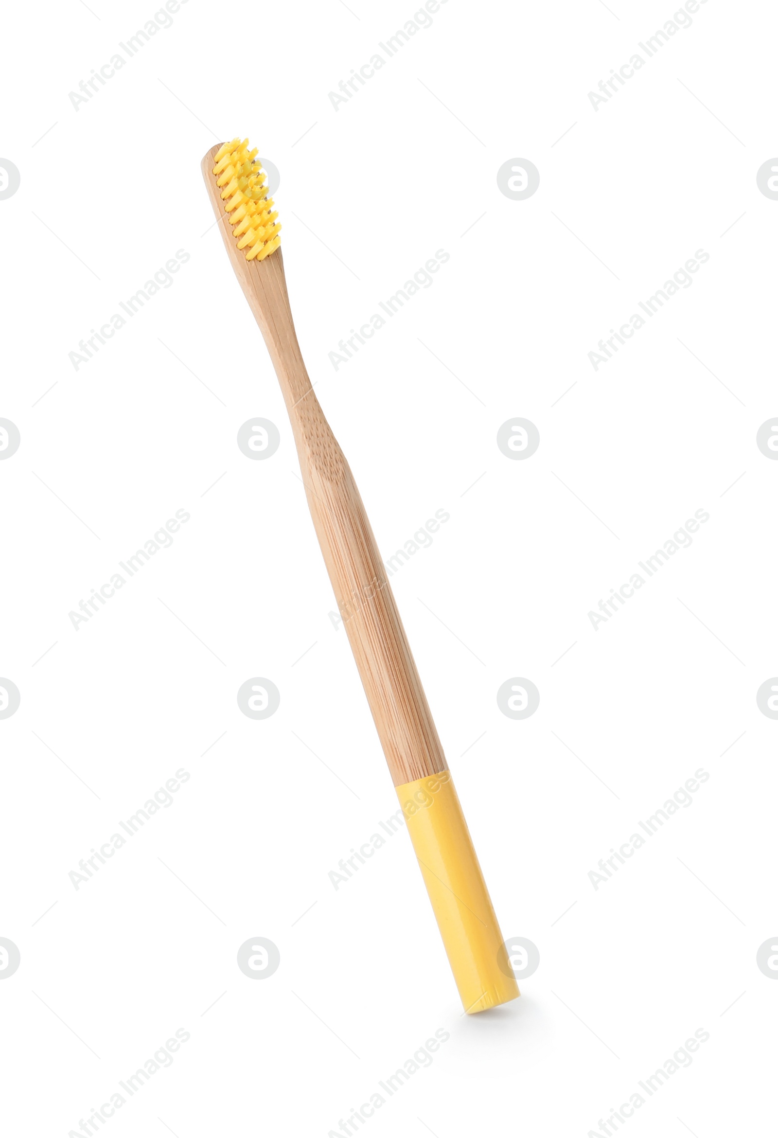 Photo of Bamboo toothbrush on white background. Dental care