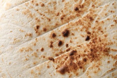 Photo of Texture of tasty tortillas as background, top view
