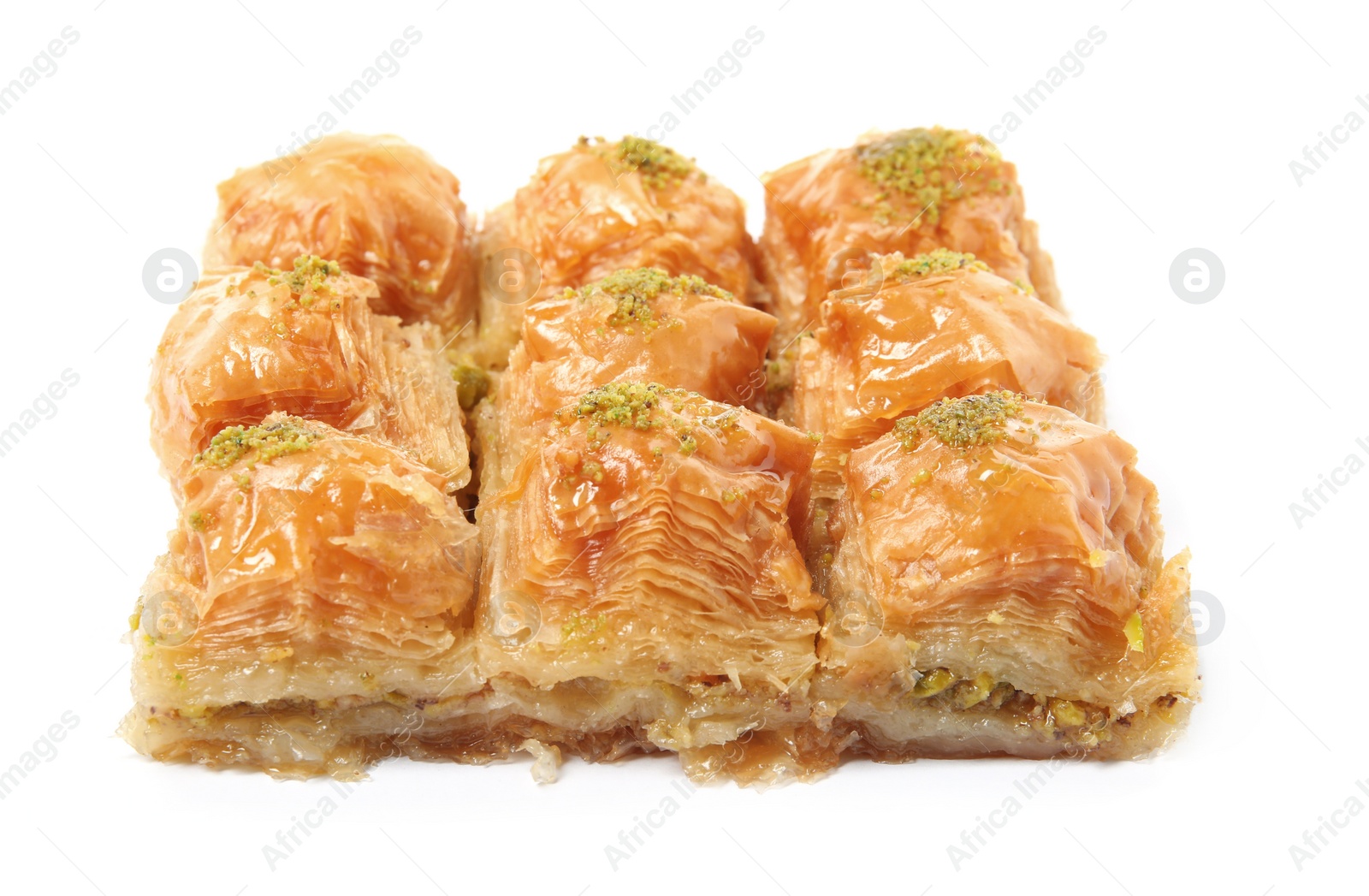 Photo of Delicious baklava with pistachios isolated on white