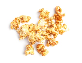 Photo of Pile of delicious caramel popcorn on white background