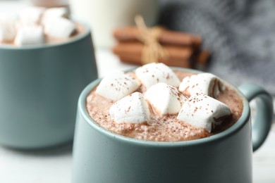 Photo of Cup of delicious hot cocoa with marshmallows, closeup