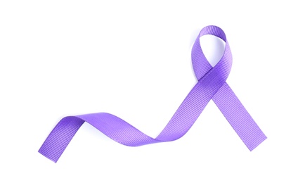 Photo of Purple awareness ribbon on white background, top view