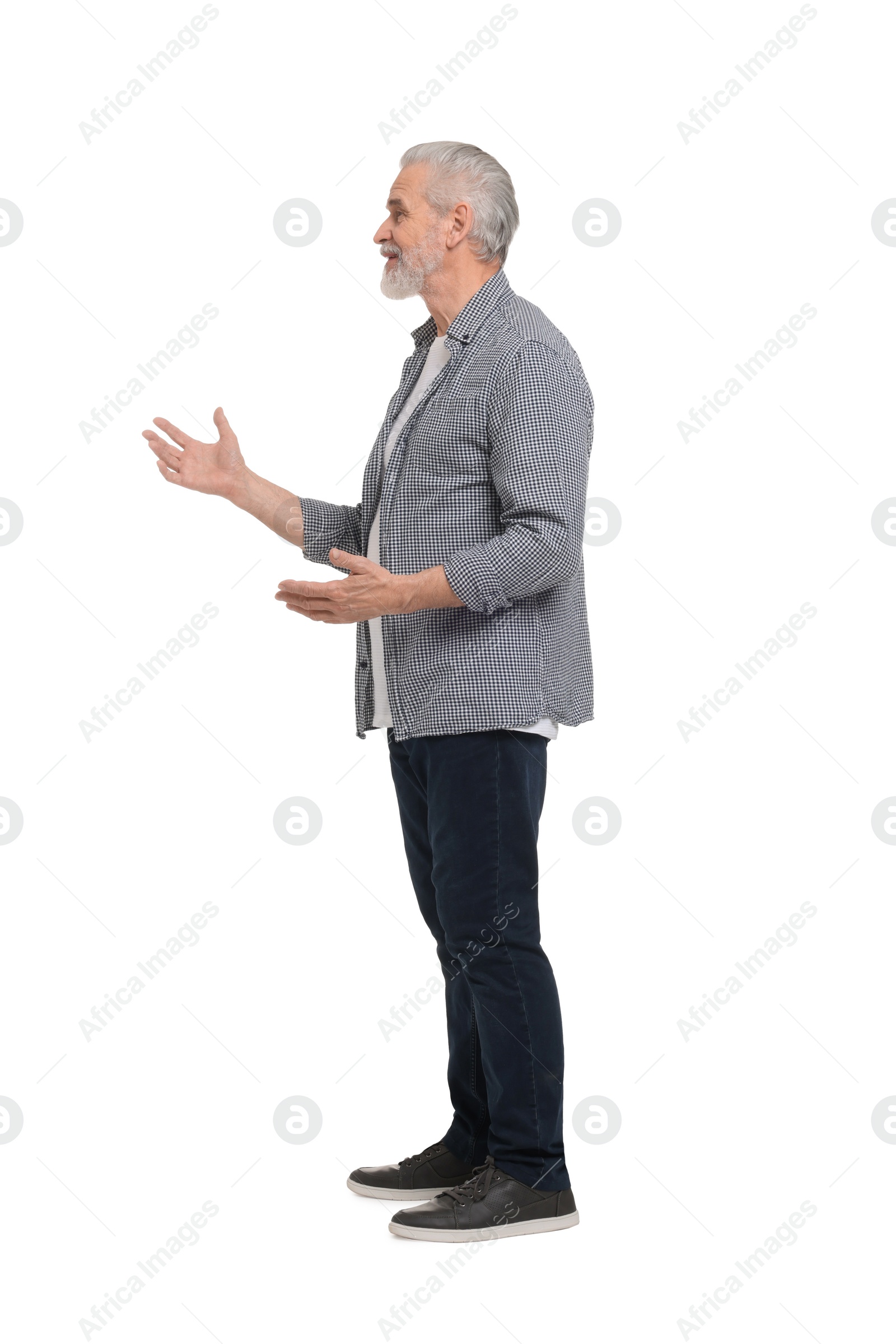 Photo of Senior man greeting someone on white background