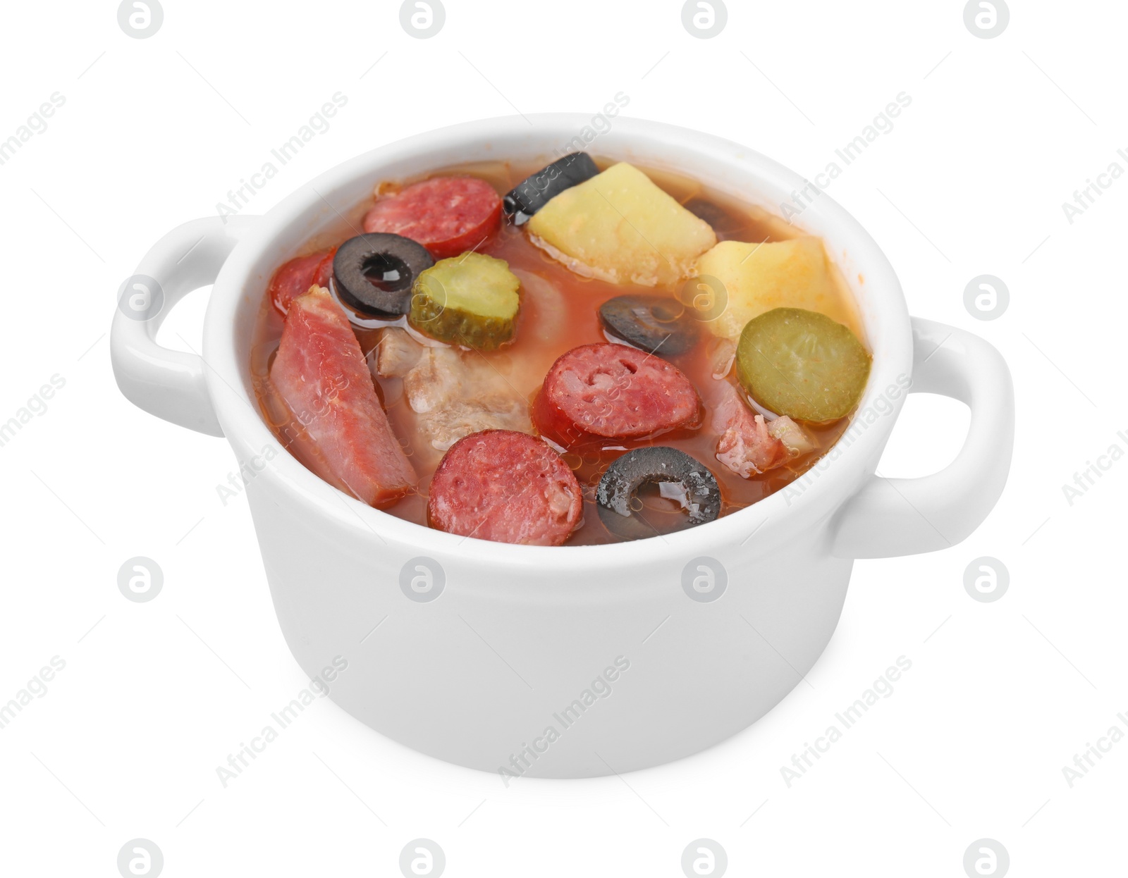 Photo of Meat solyanka soup with thin dry smoked sausages in pot isolated on white