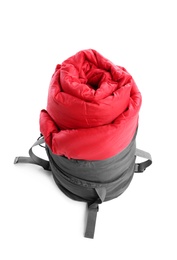 Photo of Rolled sleeping bag on white background. Camping equipment