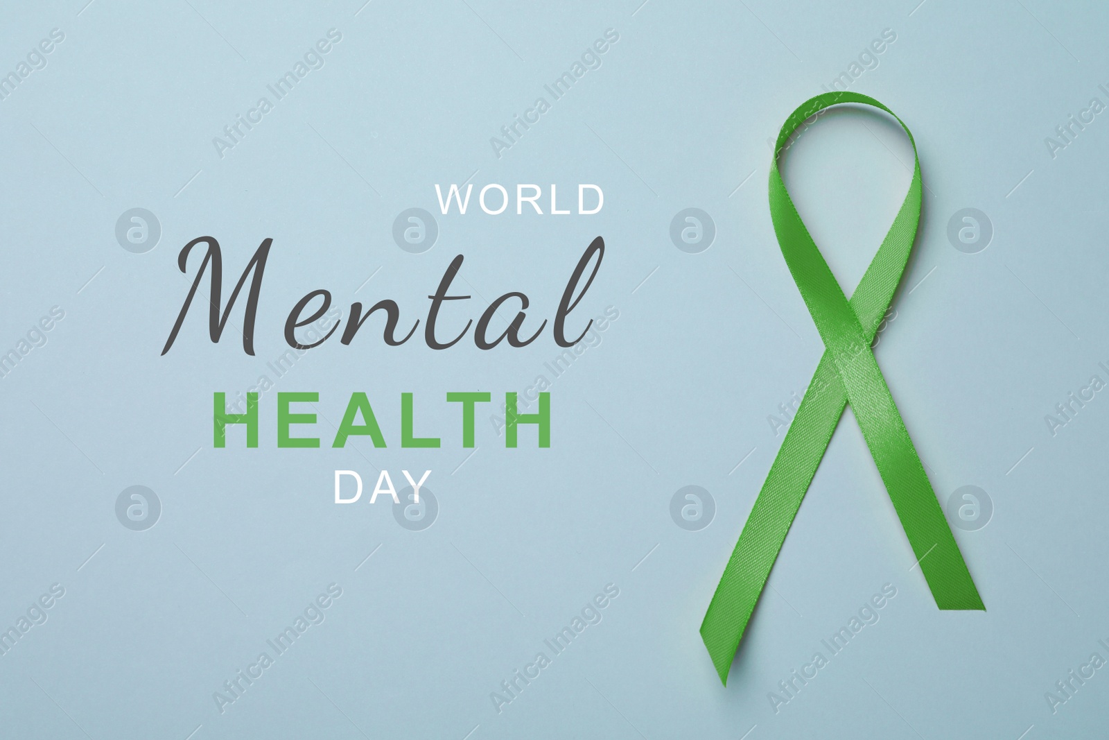 Image of World Mental Health Day. Green ribbon on light blue background, top view