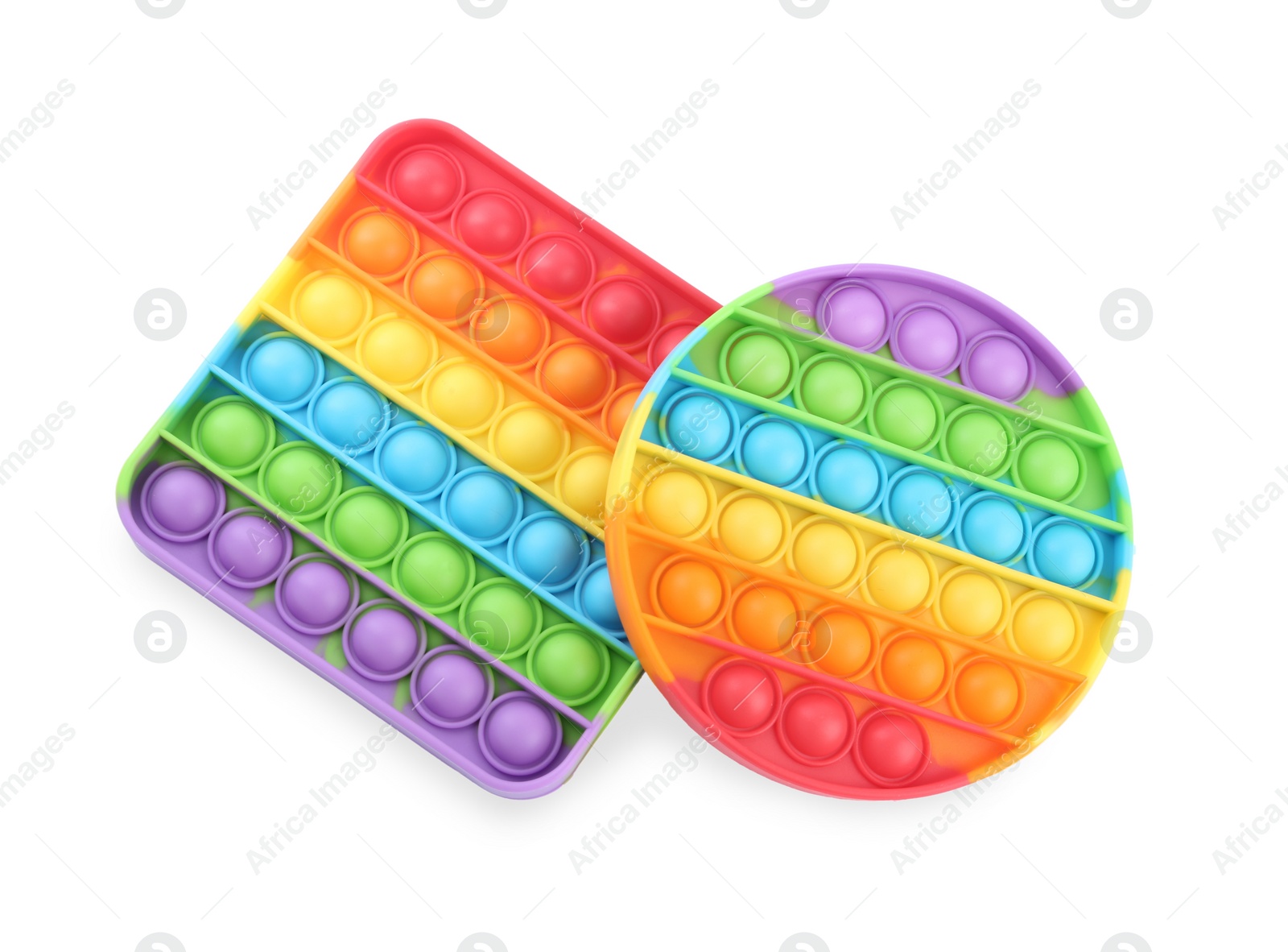 Photo of Rainbow pop it fidget toys on white background, top view