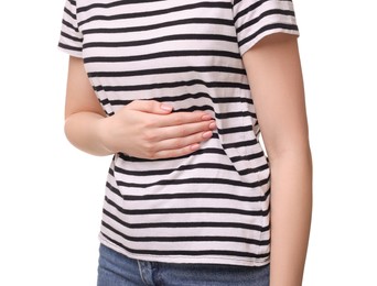 Young woman suffering from stomach pain on white background, closeup