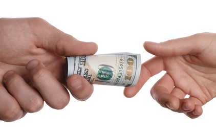 Photo of Money exchange. Man giving dollar banknotes to woman on white background, closeup