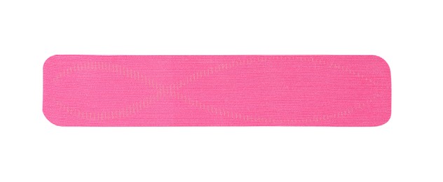 Photo of Pink kinesio tape piece on white background, top view