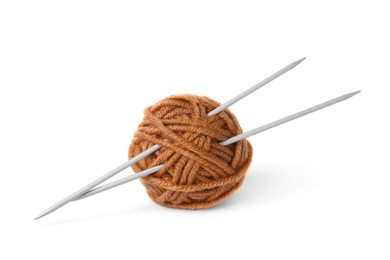 Photo of Soft brown woolen yarn and knitting needles on white background