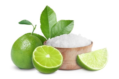 Image of Limes and salt isolated on white. Margarita cocktail ingredients