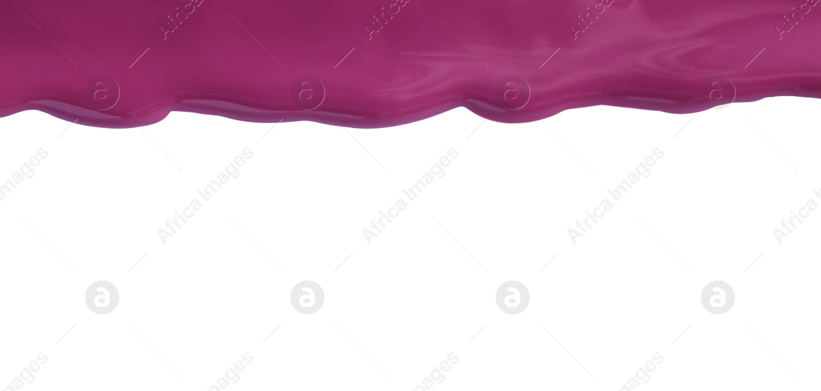 Photo of Purple nail polish flowing on white background