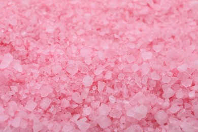 Photo of Pink sea salt as background, closeup view