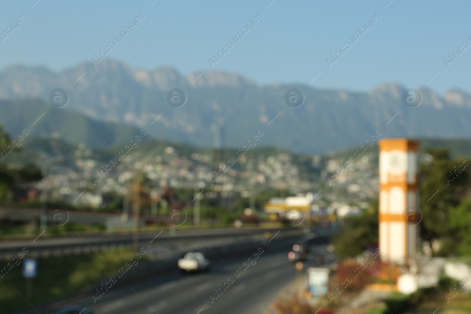 Photo of Picturesque view of city and highway in mountains