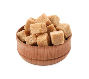 Wooden bowl of brown sugar cubes isolated on white