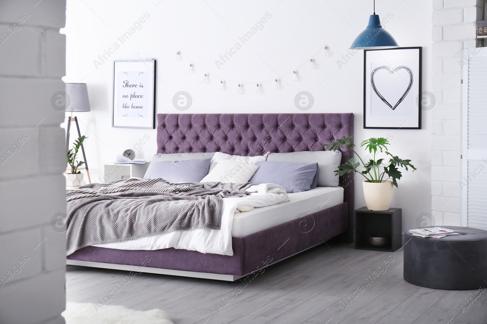 Photo of Bedroom interior with comfortable soft bed