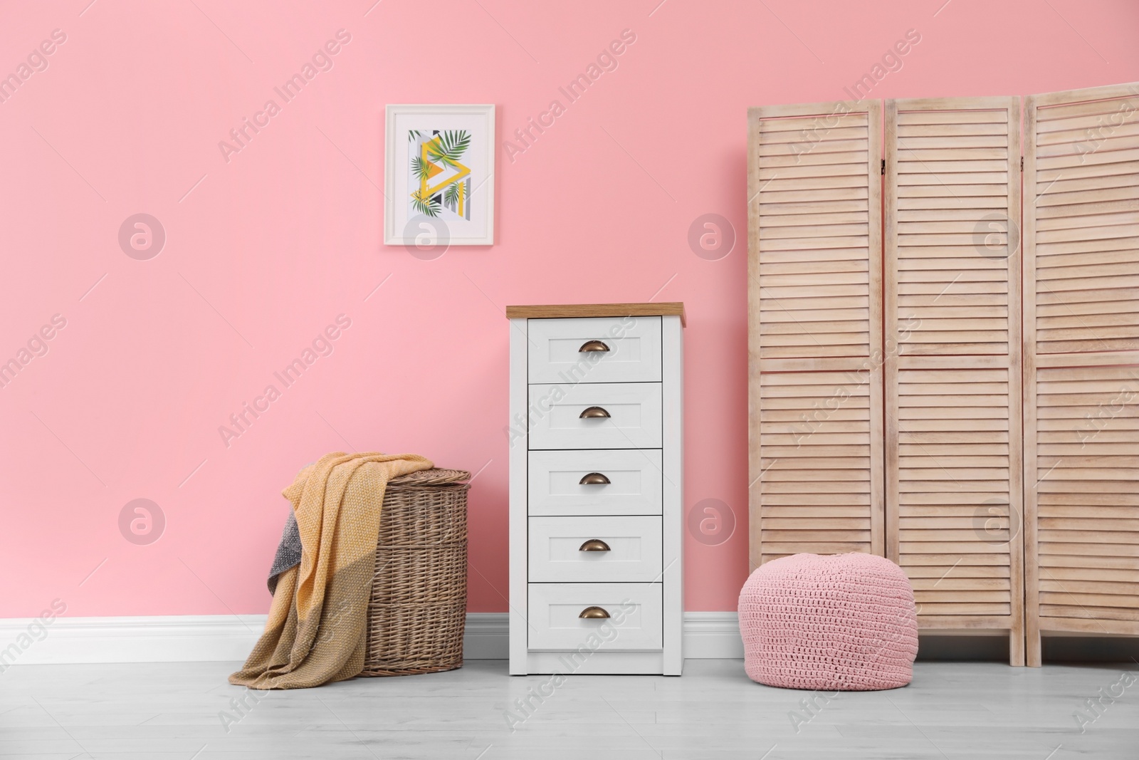 Photo of Chest of drawers in stylish living room interior