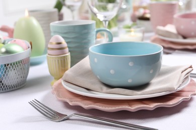 Photo of Festive table setting with elegant dishware, closeup. Easter celebration